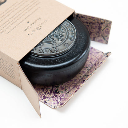 Black soap bowl in a decorative box with floral pattern