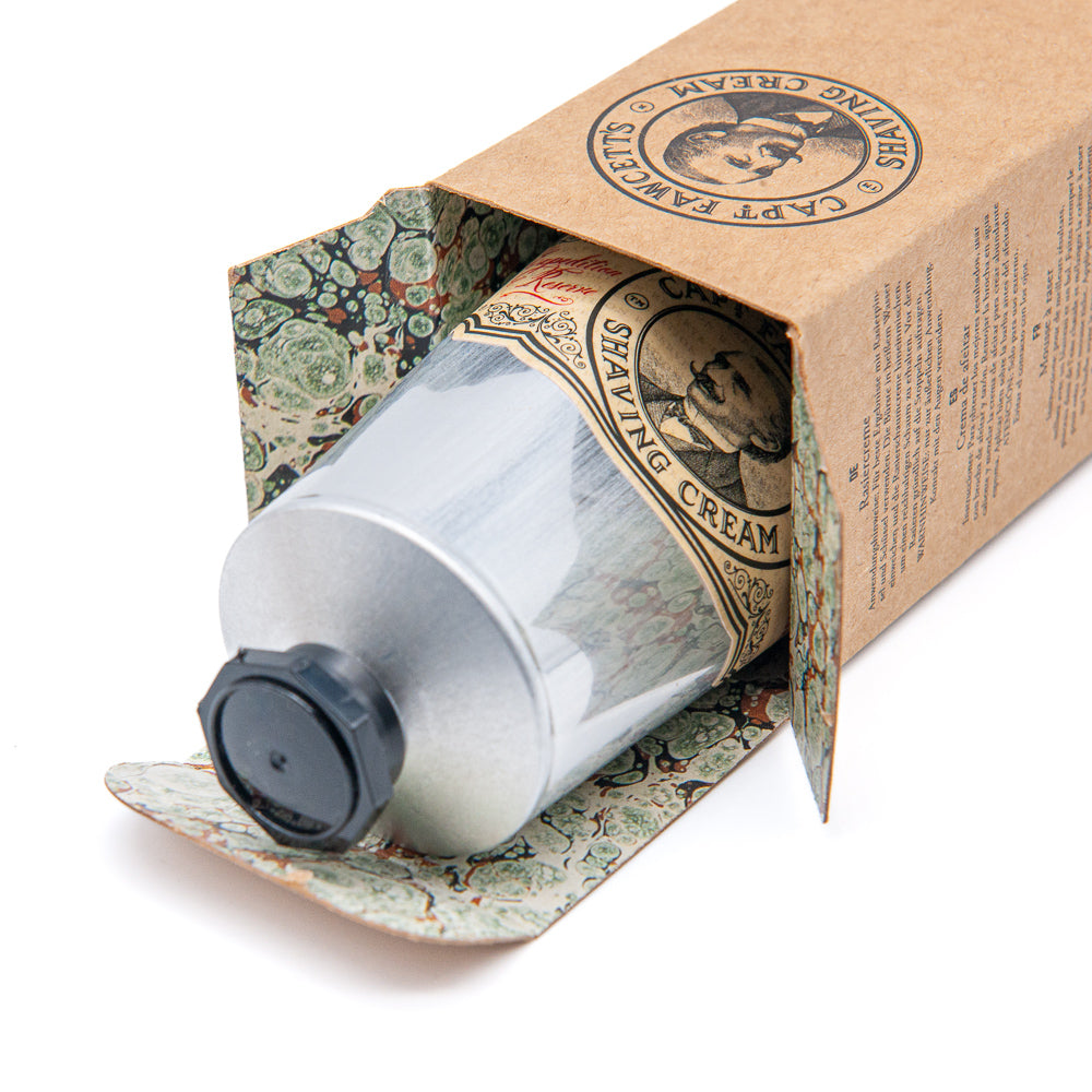 Shaving cream can with vintage-style packaging on a white background