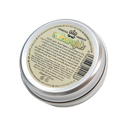Jar of beard balm with label and silver lid on a white background